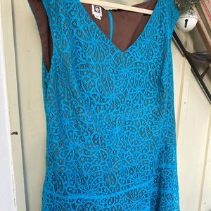 Turquoise lace over brown dress
